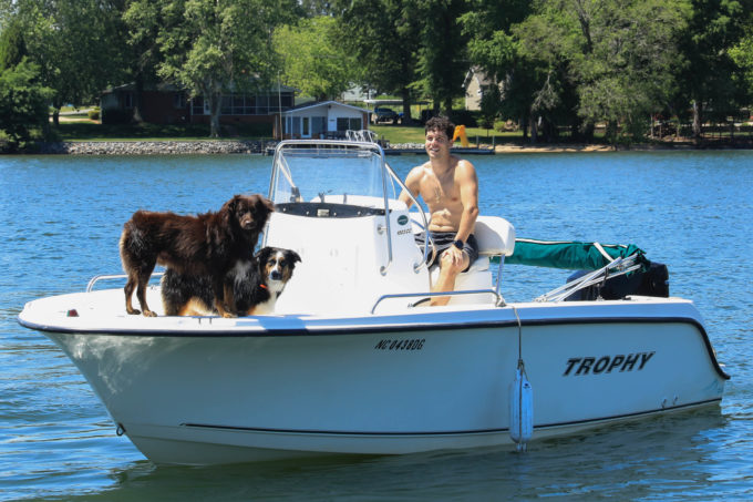 Dogs on Boat with Owner