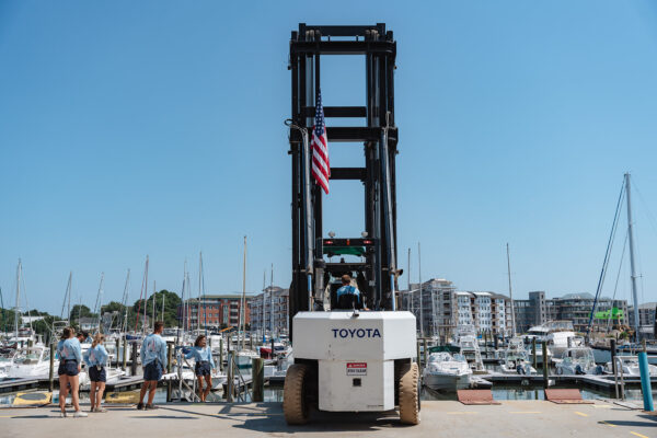 forklift and boats at little creek