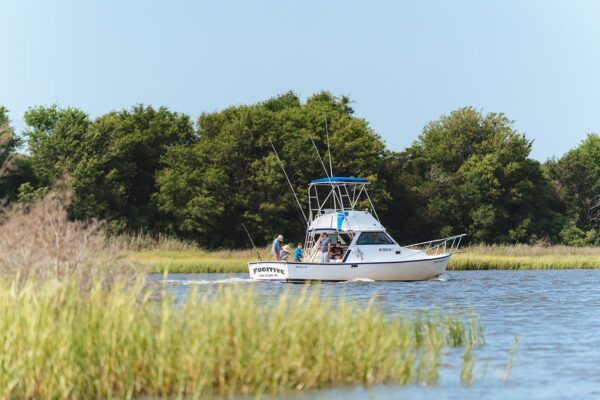 fishing boat and marsh in southport