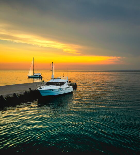 Boat during sunset out to sea
